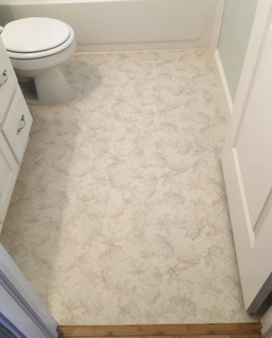 Vinyl sheet flooring installation